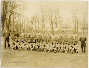 Group portrait of 'Golden Tornado' football team from African-American school, Storer College.