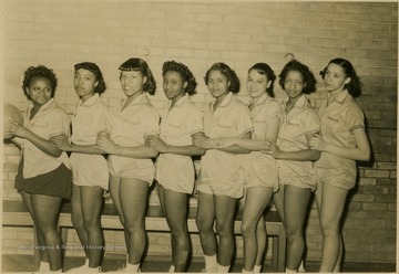 Group portrait of girls' basketball team members at African-American school, Storer College. They had 3 wins and 5 loses.