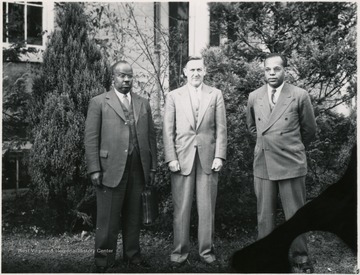 President Richard McKinney at right.