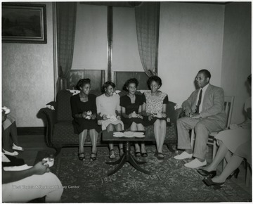 President Richard McKinney seated in right corner.