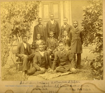 Graduates in front of building on Storer Campus. First Row: John Willson, R.H. Parker, W.A. Saunders, S.B. Ellis. Second Row: Daisy Nickens, A.L. Tollierer, Harriet Brown. Third Row: Charles Bell, N. Wiley, Pela Penick.