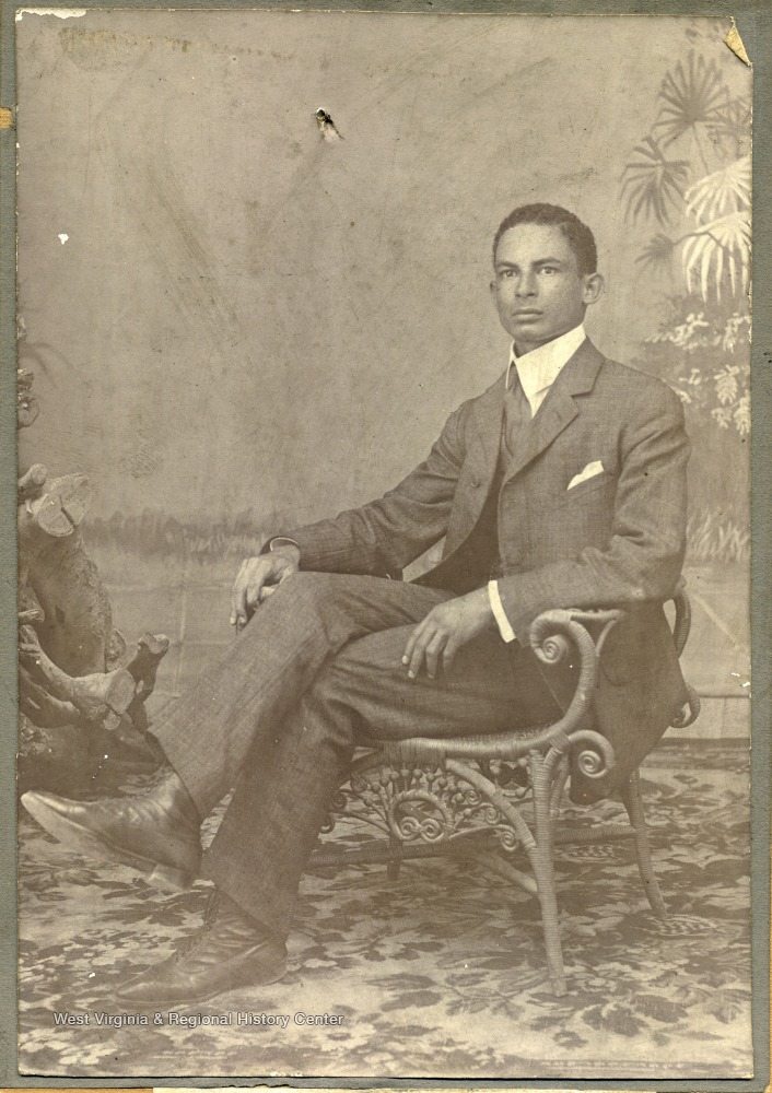 Portrait of Henrie Van Leester from Suriname, Dutch Giana. Back of photo says, 'Mr. McDonald, This is my boy whom you may expect soon. Henrie Van Leester. S. A. Esterbrook.'